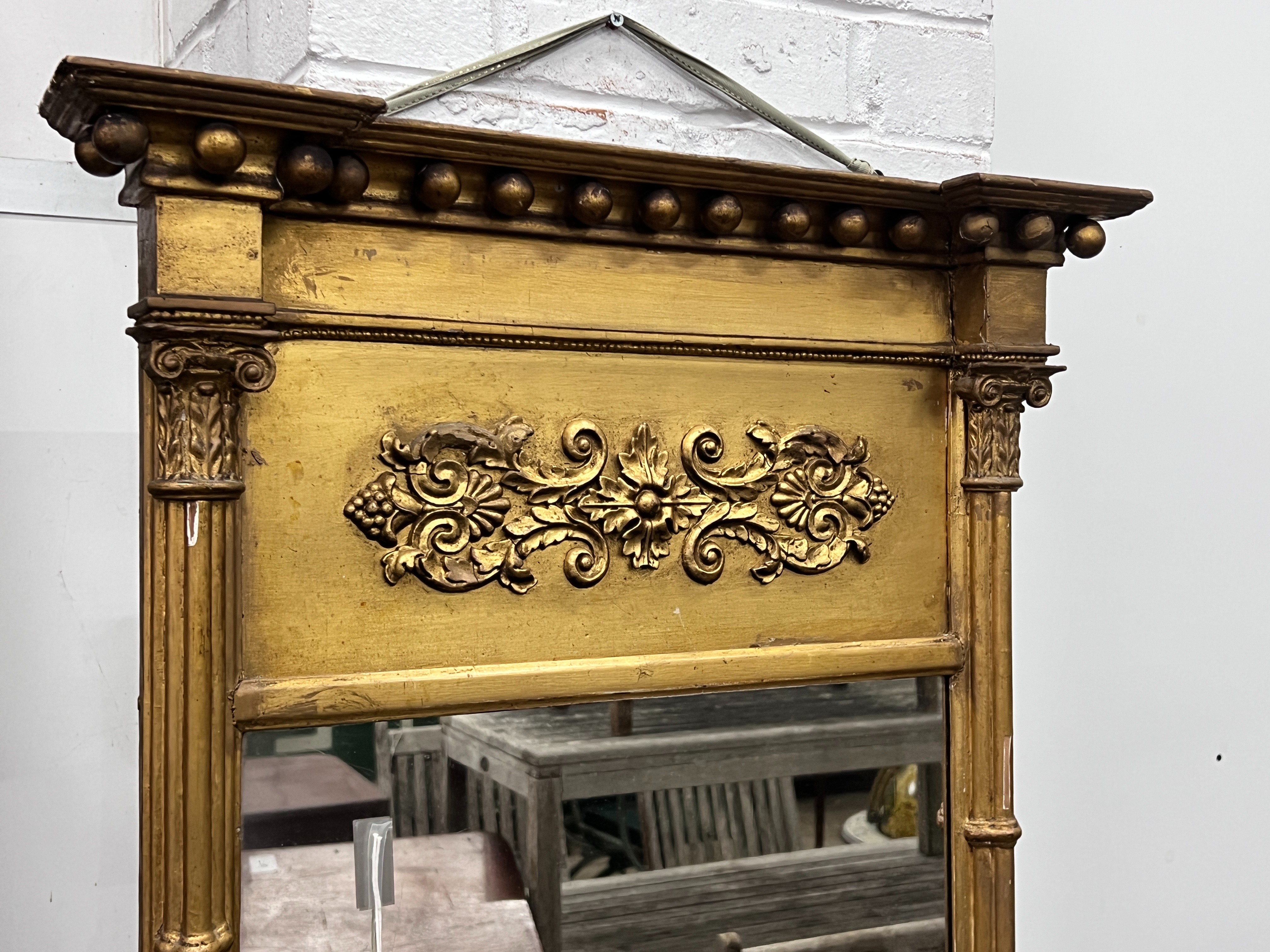 A Regency gilt wood and gesso pier glass, width 62cm, height 92cm